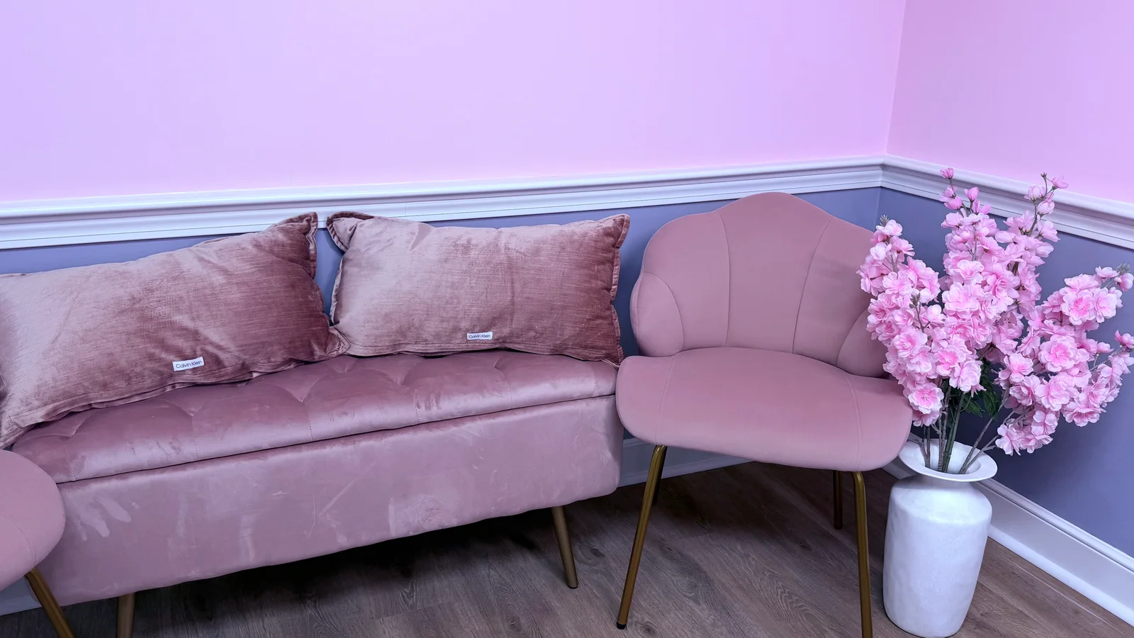 The pink client lounge at KDL Aesthetics in Franklin, MA
